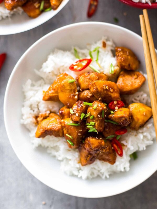 Bourbon Chicken is one of our favorite easy Chinese Takeout meals to make at home on busy nights. This Bourbon Chicken Recipe is the best sweet and spicy chicken recipe, with the best bourbon chicken sauce. Even better, you can make it in minutes! So much flavor and so little fuss!