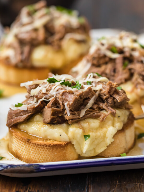 open faced roast beef sandwiches on a plate