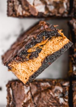 Pumpkin Brownies are an easy fall dessert recipe perfect for Halloween or Thanksgiving. Add a layer of pumpkin to your brownies for something fun and delicious!