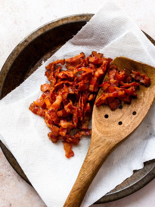 bacon crumbles with wooden spoon