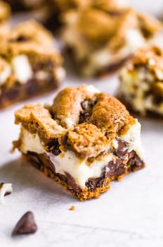 Chocolate Chip Cheesecake Bars are a creamy, chocolaty dessert perfect for game day or just for after dinner. This cheesecake bars recipe is easy to make and oh so yummy!