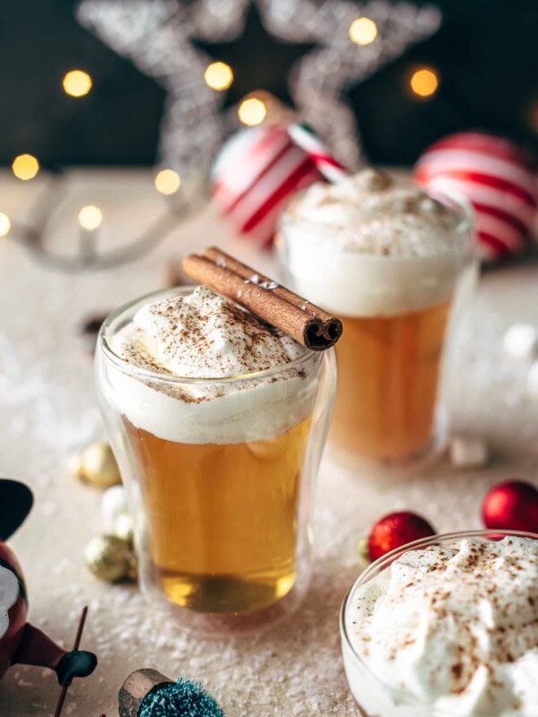 This Caramel Apple Hot Toddy Cocktail is the perfect winter drink! This apple cider hot toddy is so warming, comforting, and tasty. The best holiday cocktail!