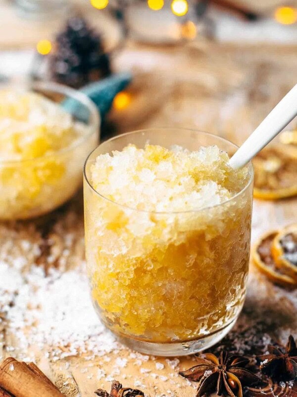 This Bourbon Slush cocktail drink is loved by all who come to my house on Christmas Eve. We have this Orange Bourbon Slush every year and it's such a fun and easy drink recipe, you have no reason not to try it!