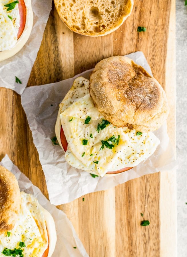 This Egg White Delight Recipe is my favorite Mcdonald's Copycat Recipe! When I used to work in an office, I ate a McDonald's Egg White Delight almost every morning. I'm so glad I've found a healthy & easy breakfast sandwich recipe that I can make at home instead. This delicious sandwich consists of an English Muffin with ham, white cheddar, egg whites, and herbs. Totally delicious!