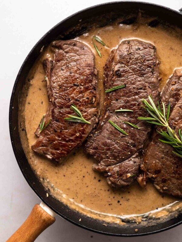 garlic rosemary steak in a skillet