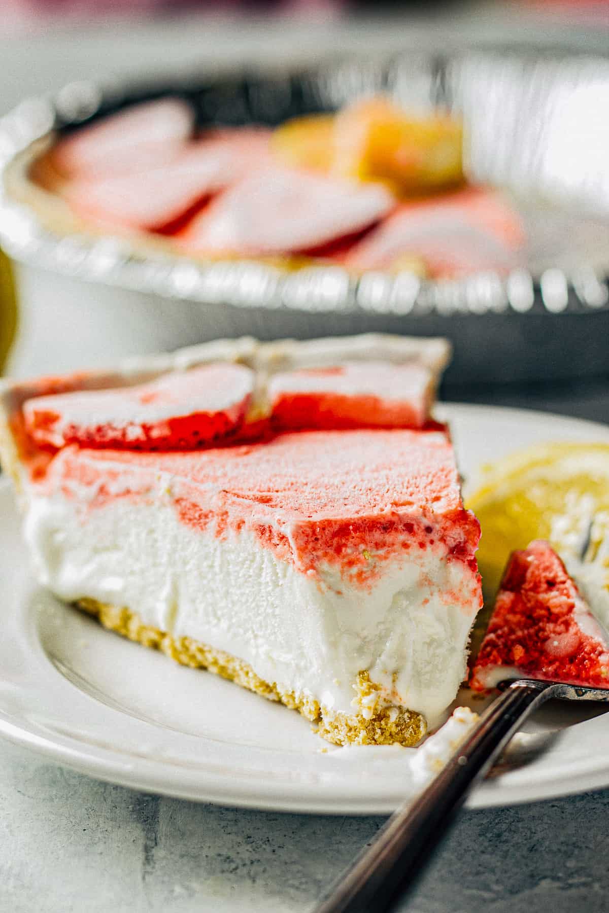 slice of strawberry lemonade pie