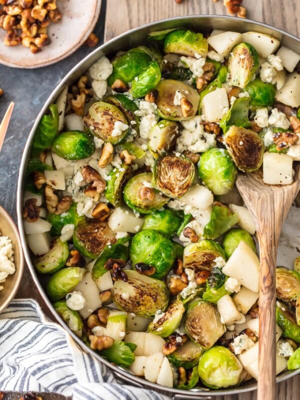  This Brussels Sprouts Recipe with Pears, Blue Cheese, and Walnuts Pear and Blue Cheese Roasted Brussels Sprouts is our favorite way to dress up a healthy side dish. These Brussels Sprouts are unique and so full of flavor. The pear pairs (ha!) beautifully with the blue cheese and toasted walnuts, making sure even the pickiest eater want to eat their greens. Such a great holiday side dish!