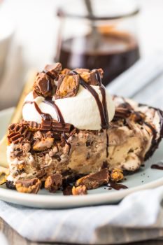 Peanut Butter Ice Cream Pie is an easy and delicious dessert! This Chocolate Peanut Butter Pie only needs 5 ingredients, and it feature everyone's favorite Peanut Butter Cups. This ice cream dessert will be a quick family favorite! Chocolate Peanut Butter Pie is my weakness. Making peanut butter ice cream cake at home has never been easier (or more delicious).