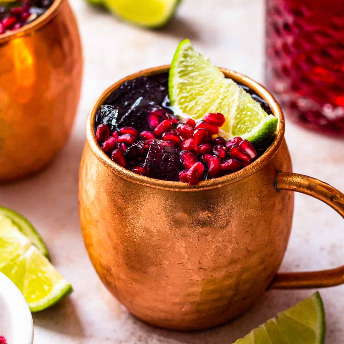 https://www.thecookierookie.com/wp-content/uploads/2014/10/featured-pomegranate-moscow-mule-recipe.jpg