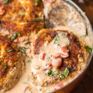 Basil Chicken with Cream Sauce has always been one of my favorite recipes. This Basil Chicken Recipe has a creamy sauce made with buttermilk and cheese that is just to die for. Easy breaded chicken, tomatoes, fresh herbs, and more make up this super easy, delicious, and fool-proof Skillet Chicken Recipe. You need this Cream Chicken in your life ASAP!