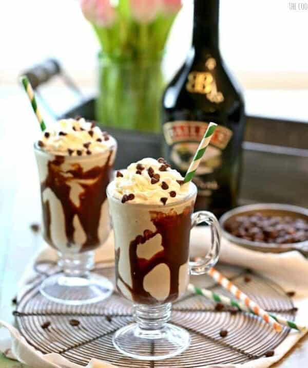 Irish Cream Shakes topped with whipped cream on table