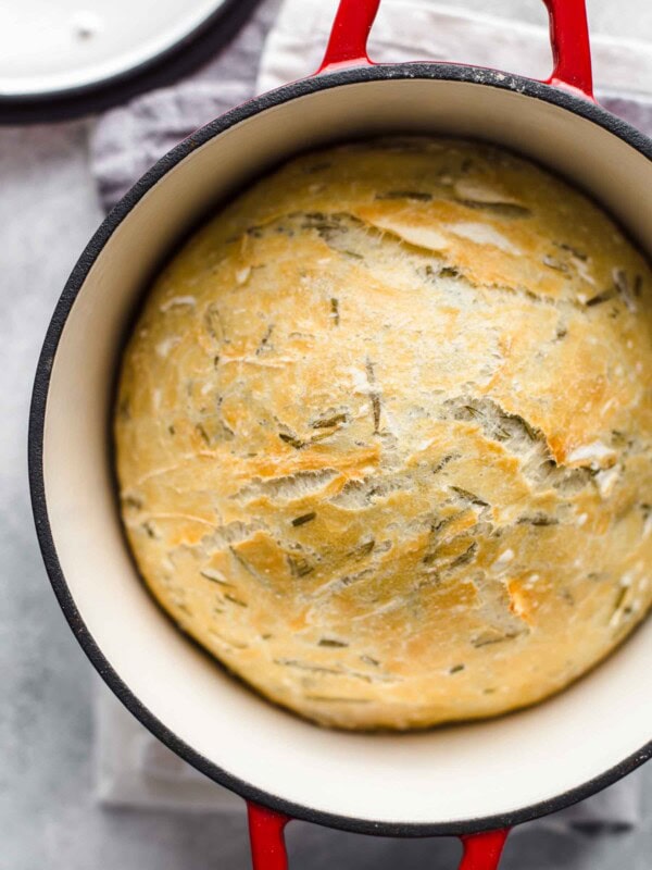 Dutch Oven Bread is such a simple way to make homemade bread. Making no knead bread in a dutch oven is just so easy, it's completely changed the way I think about baking bread! This Rosemary Bread with Sea Salt is simply perfect & tastes amazing. If you're looking for an easy bread recipe, this is it!