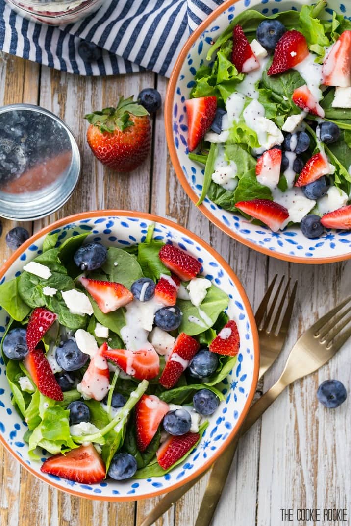 Red White and Blue Mason Jar Salad! So cute and easy. Perfect for Memorial Day and Fourth of July! Strawberry and Blueberry Salad with Feta. Yum.