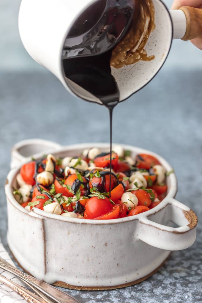 Chopped Caprese Salad is the perfect easy side dish for any BBQ! Simple, delicious, and healthy! Tomato, Mozzarella, Basil, and Balsamic Vinegar. A family favorite!