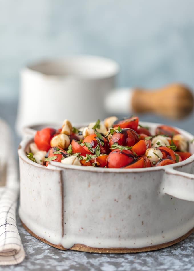 Chopped Caprese Salad is the perfect easy side dish for any BBQ! Simple, delicious, and healthy! Tomato, Mozzarella, Basil, and Balsamic Vinegar. A family favorite!