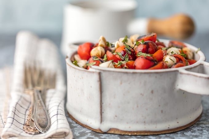 Chopped Caprese Salad is the perfect easy side dish for any BBQ! Simple, delicious, and healthy! Tomato, Mozzarella, Basil, and Balsamic Vinegar. A family favorite!