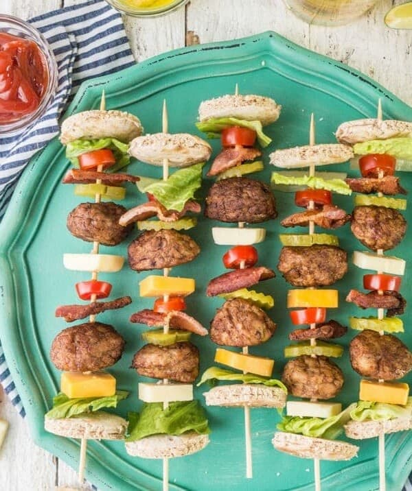 Deconstructed Bacon Cheeseburger Kebabs!! Such a fun and cute appetizer on the grill for Summer. Loaded with meatballs, cheese, bacon, and all the fixings of a great burger!