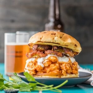 Crockpot Buffalo Chicken is so simple, delicious, and versatile! Throw it on a bun for the perfect Pulled Buffalo Chicken Sandwich. If you love chicken and love spicy food, it doesn't get better than Slow Cooker Buffalo Chicken...making a great topping for sandwiches, tacos, nachos, and more!