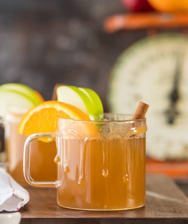 Crockpot Apple Cider is the easiest way to make delicious apple cider from scratch! Even better, this recipe is skinny, low calorie version. This Caramel Apple Cider is the BEST drink recipe for fall. Make it a cocktail or mocktail, both are DELISH. I crave this comforting sip all year round!