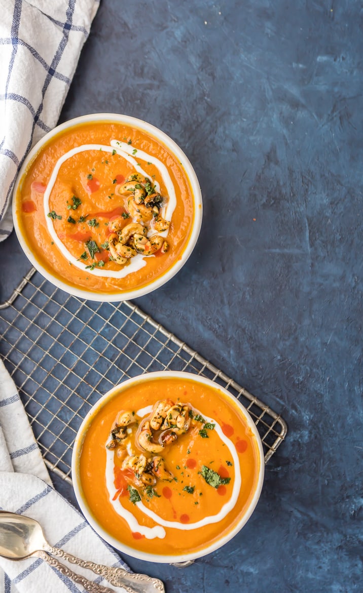 Vegan Pumpkin Soup with Candied Cashews...a healthy and delicious Fall favorite made in minutes! SO MUCH FLAVOR! Made with cashew milk and topped with spicy sweet cashews. Perfect recipe for Thanksgiving and Christmas!