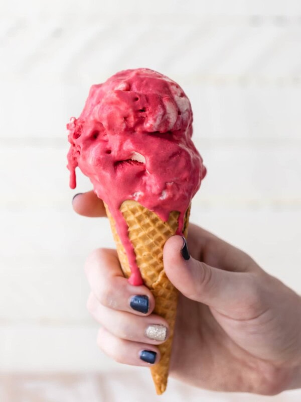 Red Velvet Ice Cream is one of my favorite homemade ice cream recipes. This cream cheese ice cream is the perfect mix of red velvet flavor and cream cheese icing. This easy homemade ice cream recipe makes a delicious Valentine's Day dessert!