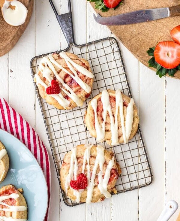 Strawberry Cinnamon Roll Cookies are the perfect Valentine's Day cookies! This easy cookies recipe is sweet, fun, and perfect for any loved one.