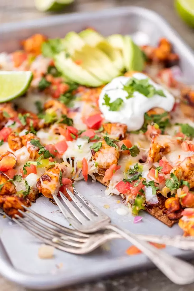 sheet pan nachos with two forks