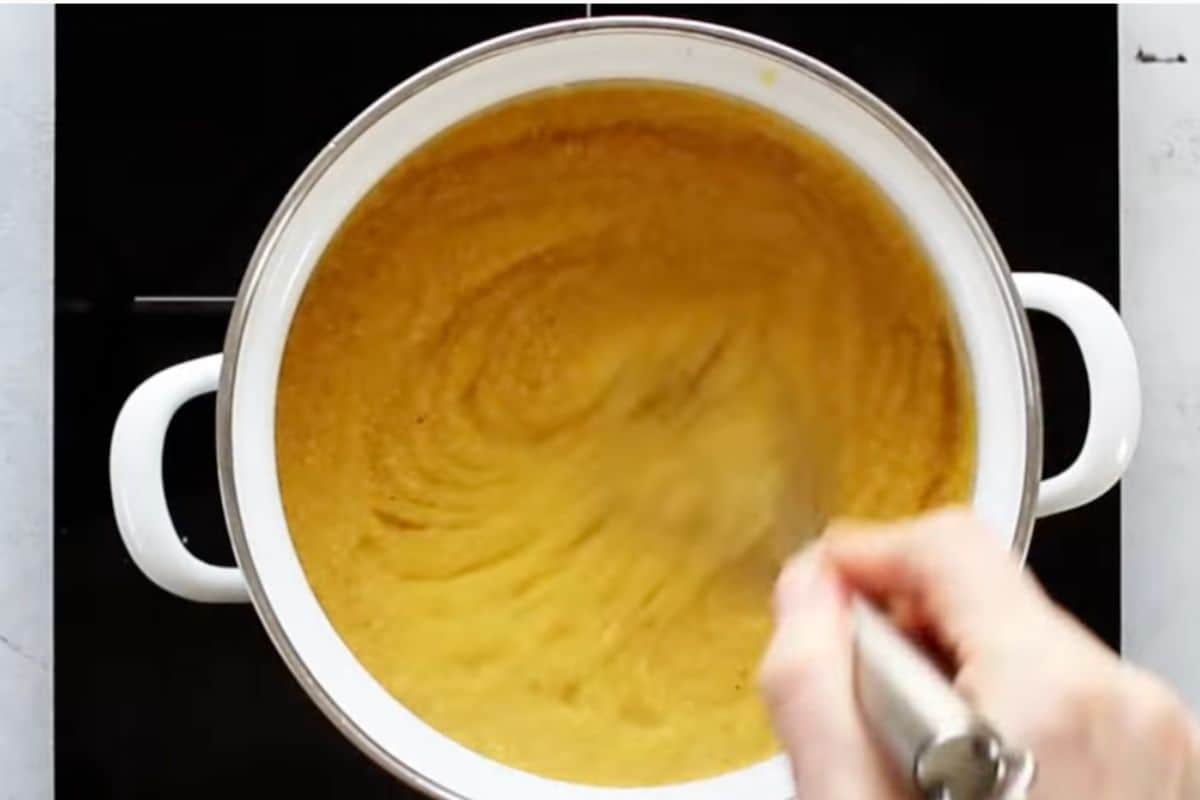 preparing polenta in a saucepan as per instructions