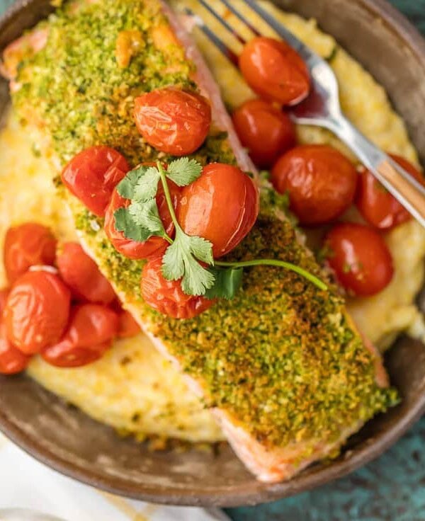 Herb Crusted Salmon with Goat Cheese Polenta on a plate