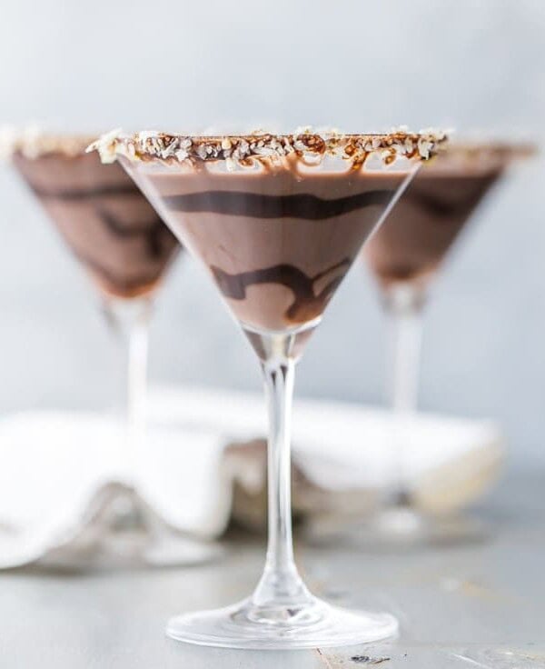 This German Chocolate Cake Martini is the perfect dessert cocktail! Tastes like you're taking a bite out of your favorite cake, in martini form! SO EASY and delicious!