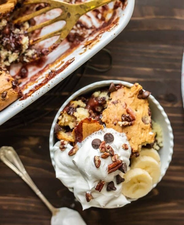 Banana Split Dump Cake is the BEST DESSERT EVER!! This dump cake is thrown together in minutes with just 6 ingredients and is sure to be an instant crowd pleaser!