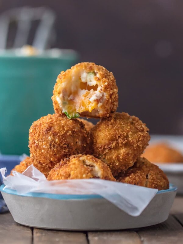 FRIED MASHED POTATO BALLS loaded with bacon, cheese, and onions are perfect for Thanksgiving leftovers! Put those leftover potatoes to good use and fry up some cheesy mashed potato bites. These loaded mashed potato balls make the ultimate appetizer or side dish!