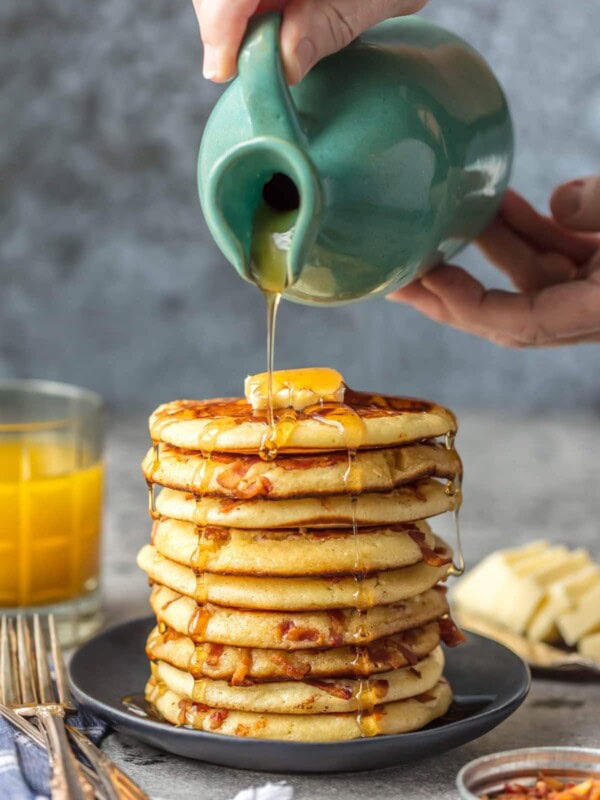 BACON PANCAKES have been a family favorite for years! We first had these savory pancakes and bacon bits at the Calgary Stampede in Canada and have been making them ever since. If you've been thinking about making Bacon Pancakes, today is the day! It's our favorite easy breakfast recipe. The savory/sweet combo just can't be beat!