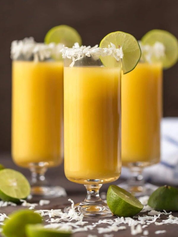 tropical mimosas in champagne flutes