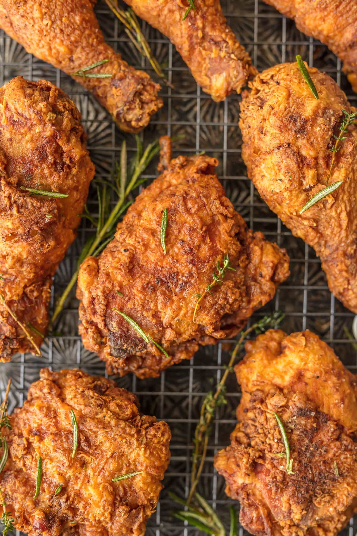 up close picture of fried chicken with rosemary