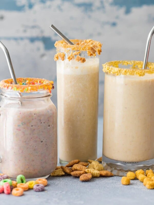 Cereal Milk Breakfast Smoothies (3 Ways!) are a fun, healthy, and easy breakfast the entire family with love! Blend your favorite cereal with milk, bananas, and ice and you're in business! Customizable for any flavor. SO FUN!