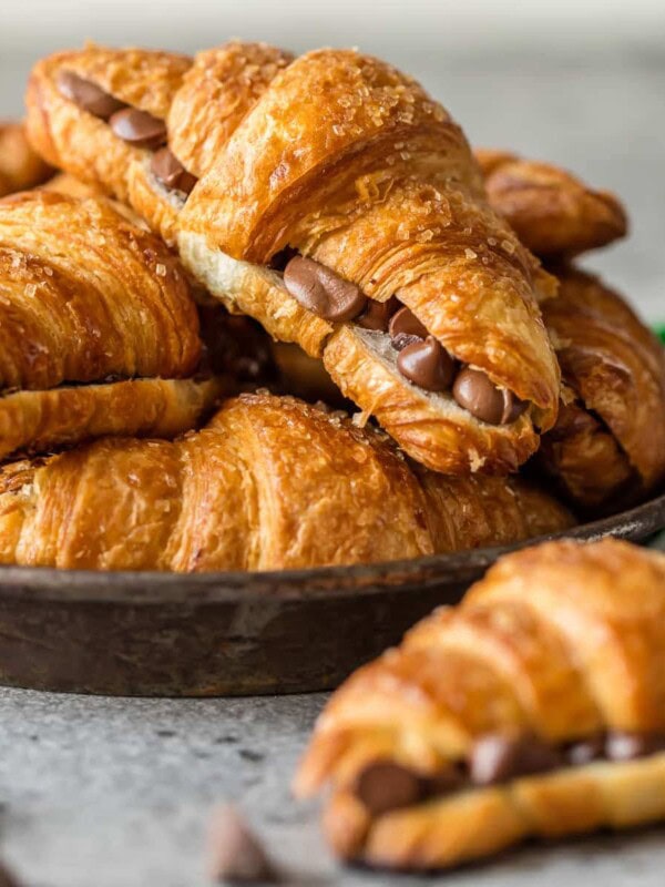 This SHEET PAN CHOCOLATE CROISSANT RECIPE is our favorite way to make a sweet breakfast for a crowd! Such a fun and easy breakfast pastry baked right in your oven.