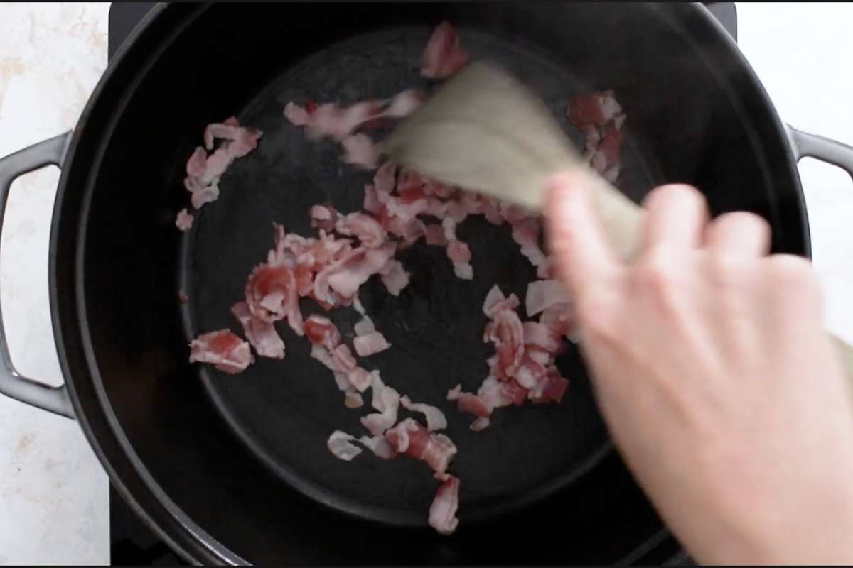 cooking bacon until browned in dutch oven.