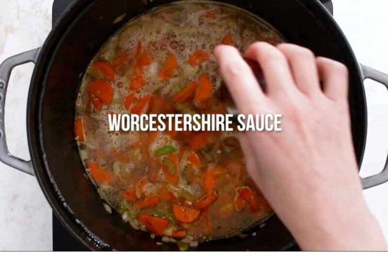 adding wine, Worcestershire, and chicken broth in veggies