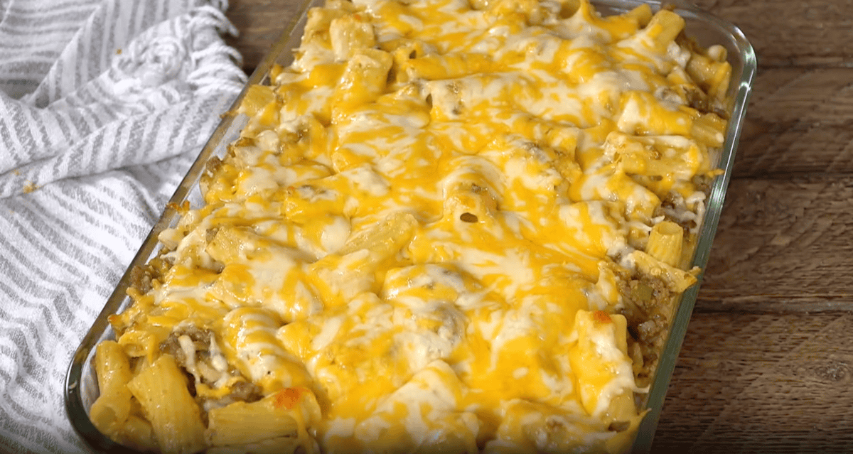 baked mexican mac and cheese in a casserole dish.