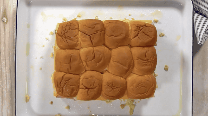 breakfast sliders on a baking sheet.