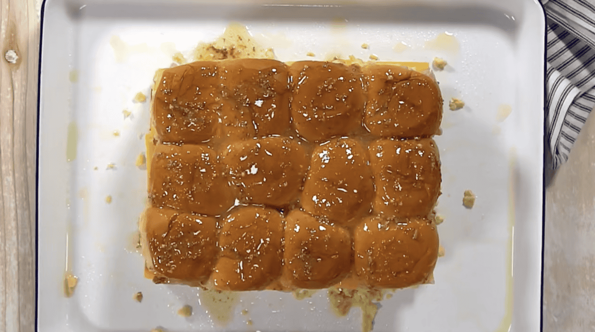 butter-soaked breakfast sliders on a baking sheet.