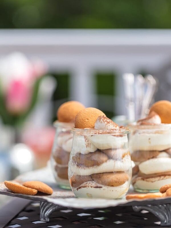 These Easy Tiramisu Cups are made with a secret ingredient, vanilla wafers! This easy tiramisu recipe is perfect for summer parties & BBQs. Easy to make, easy to serve, and easy to eat!