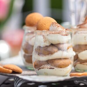 These Easy Tiramisu Cups are made with a secret ingredient, vanilla wafers! This easy tiramisu recipe is perfect for summer parties & BBQs. Easy to make, easy to serve, and easy to eat!