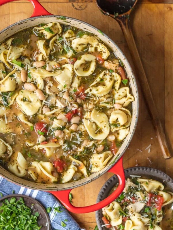 This Pesto Chicken Tortellini Soup recipe is the ultimate comfort food! Throw some amazing ingredients into a pot & you've got the best pesto tortellini soup.