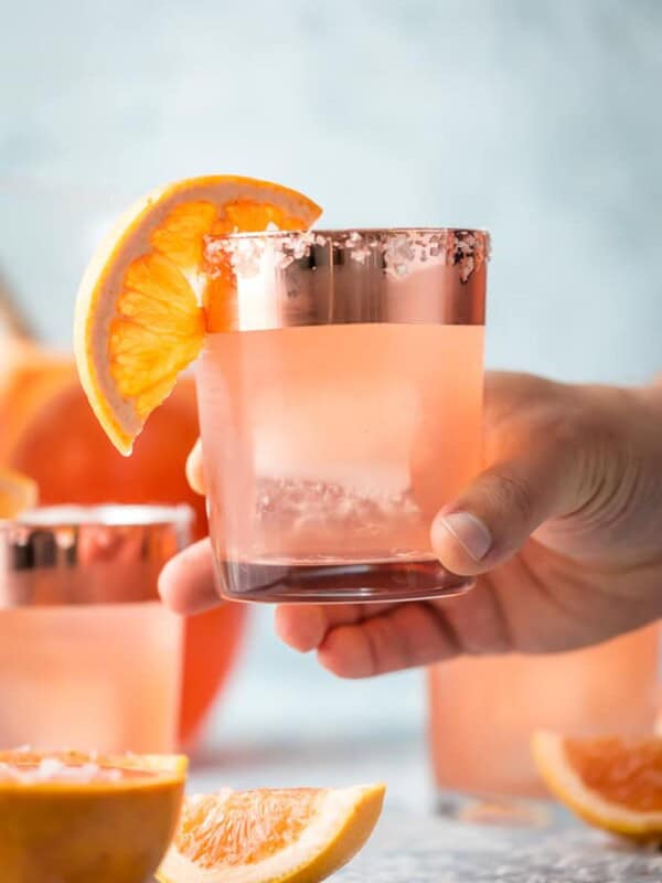 SALTY DOG SANGRIA is the ultimate refreshing Summer cocktail! Grapefruit vodka, juice, rose, club soda, and simple syrup come together in one refreshing and beautiful sip.