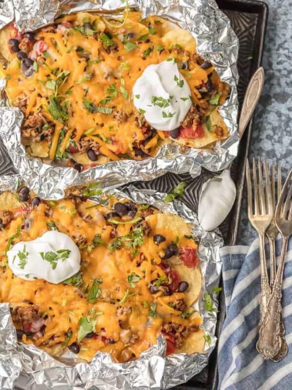 We love throwing these FOIL PACKET NACHOS on the grill any time of year! Loaded with beef, tomatoes, green chiles (and more), and covered in melty cheese. Obsessed.