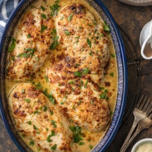 This Caesar Chicken Recipe (MELT IN YOUR MOUTH and only 4 Ingredients!) is made with only 3 ingredients (say WHAT?!) and is oh so tender and delicious. Easiest tastiest weeknight dinner ever. Made with just chicken, sour cream, creamy caesar, and grated parmesan. It will knock your socks off for both its flavor and how easy it is!