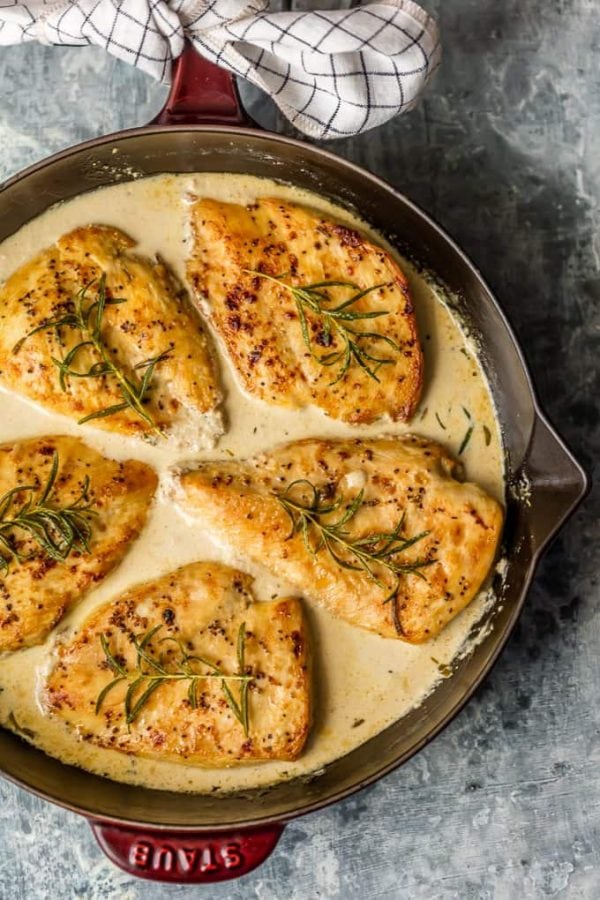 Chicken Dijon with White Wine Sauce is an easy ONE PAN meal with so much flavor! The Dijon Chicken in white win sauce is so juicy and moist and smothered in the most amazing sauce. Nothing is better than White Wine Chicken with Dijon. It's an awesome Date Night meal for any day of the week. Chicken Dijon for the win!