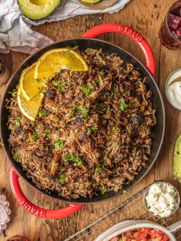 The amazing SANGRIA PORK CARNITAS are made in a slow cooker and finished in a skillet, making them crispy, juicy, and unique. The flavor is out of this world! Eat them on their own, over rice, on nachos, or as tacos! You can't go wrong, except for not trying this recipe.